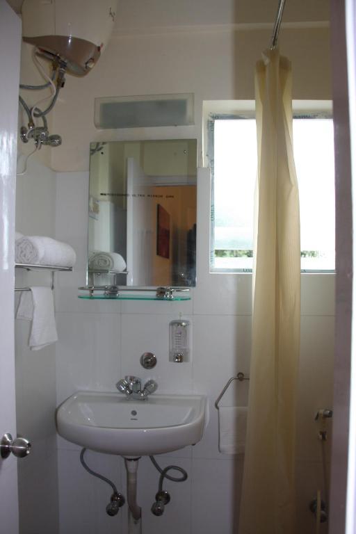Down Town Guest House Kalkutta Zimmer foto