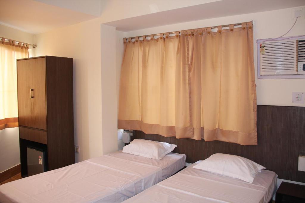 Down Town Guest House Kalkutta Zimmer foto
